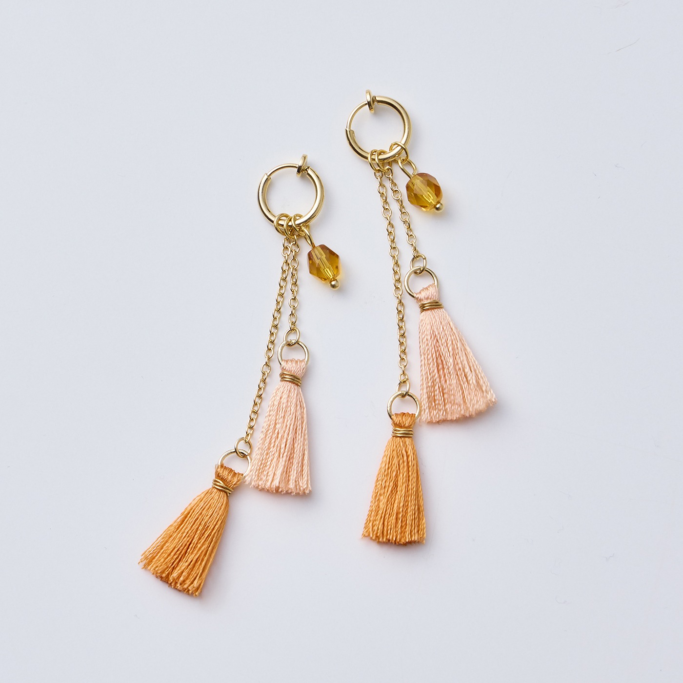 OSYAIRO［オシャイロ］|京都西陣の糸で作ったタッセルイヤアクセ〈橙〉